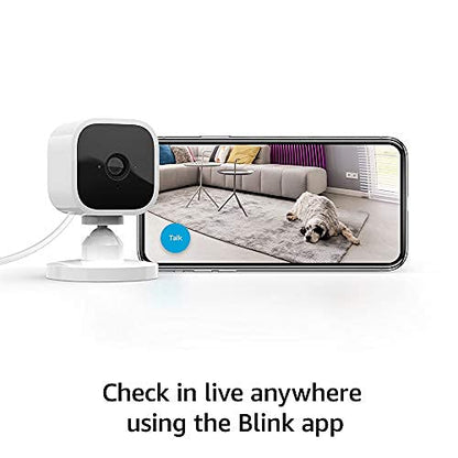 Blink Mini – Compact indoor plug-in smart security camera, 1080p HD video, night vision, motion detection, two-way audio, easy set up, Works with Alexa – 1 camera (White)-UPStoxs